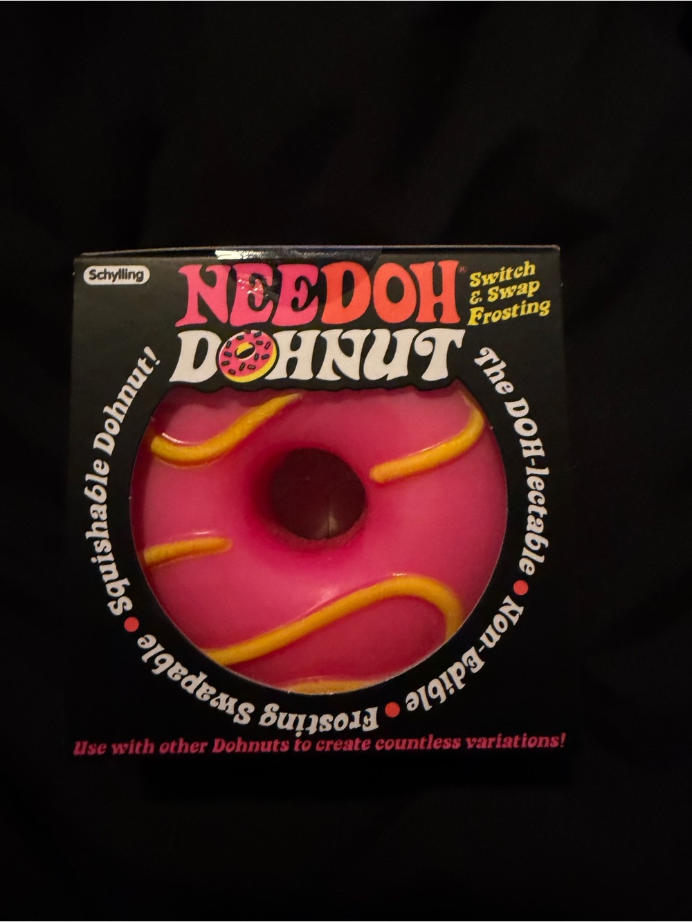 NeeDoh Donut Pink Scented Squishable Toy with Yellow Frosting
